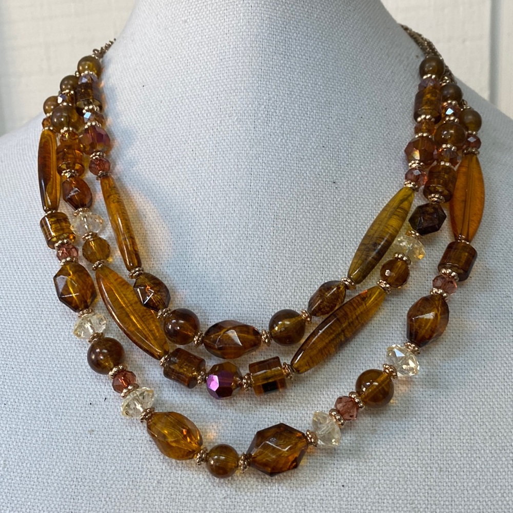 Pretty multi strand amber colored bead necklace